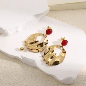 Les boucles d'oreilles Élégance Grenat